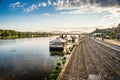 Torun, Poland - August 11, 2021. Panoramic view of Wisla river with river bank in sunset Royalty Free Stock Photo