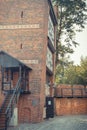 Torun, Poland - August 19, 2022: View on old leaning tower in center of city Torun. Historic attraction to visit. Vintage photo Royalty Free Stock Photo