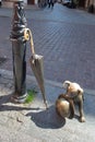 Torun, Poland - May 09, 2022: Statue of tiny dog Filus. Filus is the dog of Professor Filutek, the character of cartoons by Royalty Free Stock Photo