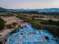 Toscane Italy, natural spa with waterfalls and hot springs at Saturnia thermal baths, Grosseto, Tuscany, Italy aerial