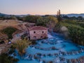 Toscane Italy, natural spa with waterfalls and hot springs at Saturnia thermal baths, Grosseto, Tuscany, Italy aerial