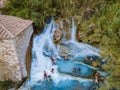 Toscane Italy, natural spa with waterfalls and hot springs at Saturnia thermal baths, Grosseto, Tuscany, Italy aerial