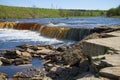 At the Tosnensky Gertovsky waterfall on a sunny May day. Leningrad region, Russia Royalty Free Stock Photo