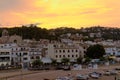 Tossa de Mar, Spain, August 2018. Sunset over the seaside town, view from the beach.