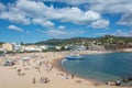 Tossa, Spain - 09/19/2017: city beach and pleasure boat