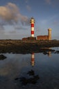 Toston lighthouse reflection Royalty Free Stock Photo