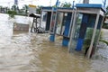 TOT public telephones are underwater in Pathum Thani, Thailand, in October 2011