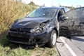 Total car crash on higway. Black hatchback is not suitable for recovery Royalty Free Stock Photo