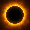 Total eclipse of the Sun with corona. Solar eclipse. Bright red star light shine from the edges of a planet. Space Royalty Free Stock Photo