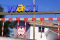 Total energies Automatic car wash brand text and logo sign identifying in gas station