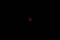 Total red color super moon lunar eclipse isolated in dark black night sky Halloween concept Royalty Free Stock Photo