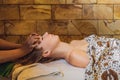 Total relaxation. Beautiful Young Wwoman Get Balinese or Thai Massage Royalty Free Stock Photo