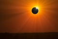 Total solar eclipse. The shadow of the moon begins to recede . Royalty Free Stock Photo