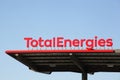 TotalEnergies logo on a gas station