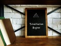 Totalitarian Regime a inscription on the sheet Royalty Free Stock Photo