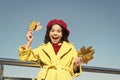 Totally happy. canada. happy small girl. autumn kid fashion. child maple leaf. kid in french beret. leaf fall. favorite