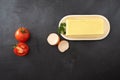 Tomato,egg and butter on chalkboard background Royalty Free Stock Photo