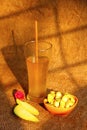 Bowl of sliced totapuri mango and glass with mango juice Royalty Free Stock Photo