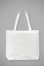 Tote bag canvas white cotton fabric cloth eco shopping sack mockup blank template isolated on grey background clipping path Royalty Free Stock Photo