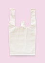 Tote bag canvas white cotton fabric cloth for eco shopping sack mockup blank template isolated on pink background clipping path Royalty Free Stock Photo