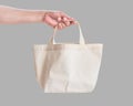 Tote bag canvas white cotton fabric cloth for eco shoulder shopping sack mockup blank template isolated on grey background Royalty Free Stock Photo