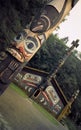 Totem Poles and Clan House Royalty Free Stock Photo