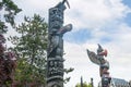 Totem Poles in Thunder  Park in Victoria on Vancouver Island in British Columbia Canada Royalty Free Stock Photo