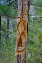 Toten carved from a dry tree