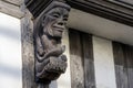 Totnes, Devon, UK - January 16. View of a wooden gargoyle in Totnes, Devon on January 16, 2024