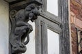 Totnes, Devon, UK - January 16. View of a wooden gargoyle in Totnes, Devon on January 16, 2024