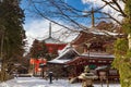 Toto Pagoda in Danjo Garan, Koyasan, covered with snow on a sunny day, Japan