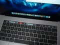 Touch bar and keyboard on Apple MacBook Pro 15 inch laptop computer Royalty Free Stock Photo