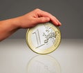 Touch the coin Royalty Free Stock Photo