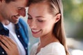 Touch, couple and forehead in embrace for love, marriage and romance or care in outdoors. People, hug and bonding or Royalty Free Stock Photo