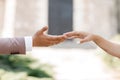 Touch of hands. Young married couple holding hands, ceremony wedding day. hand of the groom and the bride, guys and girls, Royalty Free Stock Photo