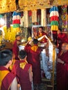 Touch heads of lamas for praying