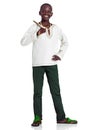 In touch with my heritage. Full length studio portrait of a young african teenage boy isolated on white. Royalty Free Stock Photo