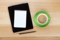 Touch screen tablet computer, notepad, pencil and cup of coffee Royalty Free Stock Photo