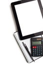 Touch tablet with calculator and blank paper Royalty Free Stock Photo