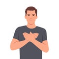 Touched positive man holds his hands on his chest, expressing gratitude Royalty Free Stock Photo