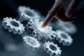 Touching a digital gear mechanism representing innovation and technology in a modern setting Royalty Free Stock Photo