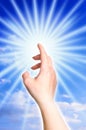 Touching divine light Royalty Free Stock Photo