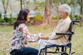 Touching hands Asian senior or elderly old lady woman patient with love