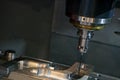 The touching probe attach with the spindle of CNC milling machine for on the machine measuring process. Royalty Free Stock Photo