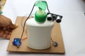 Touchless hand wash dispensing machine which is DIY project. Ultrasonic sensor and micro servo project Royalty Free Stock Photo