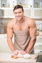 Tough looking guy makes a batch of dough himself Royalty Free Stock Photo