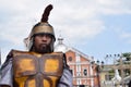 Tough, rude Roman soldier street drama, community celebrates Good Friday representing the events that led to the Crucifixion of Je