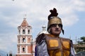 Tough, rude Roman soldier street drama, community celebrates Good Friday representing the events that led to the Crucifixion of Je