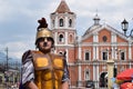 Tough, rude Roman soldier street drama, community celebrates Good Friday representing the events that led to the Crucifixion of Je