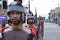 Tough, rude Roman soldier street drama, community celebrates Good Friday representing the events that led to the Crucifixion of Je